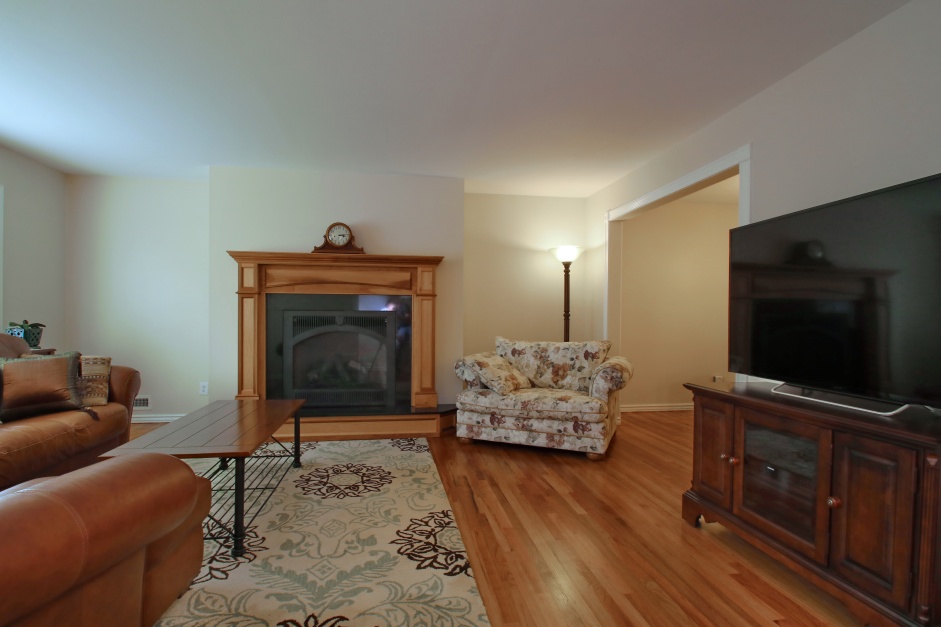 Living Room - Refinished Hardwood, Gas Fireplace